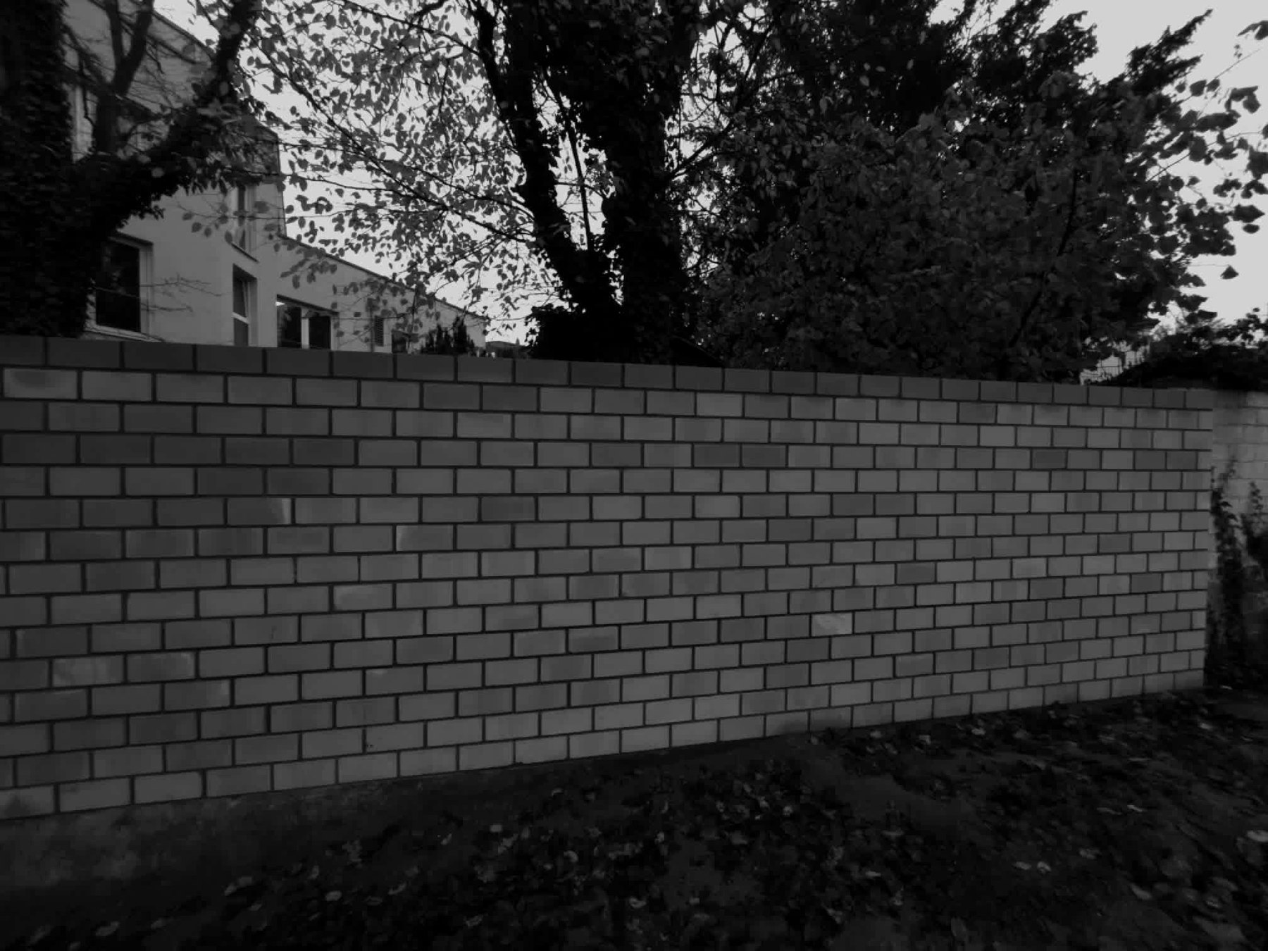 Einfriedung aus Mauerwerk – Musullu Bau